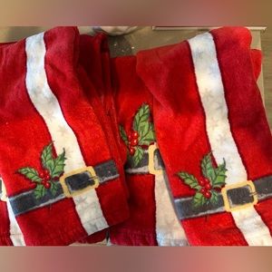 Set of Santa towels. (4) 2 holiday bath /2 hand. Purchased but never used